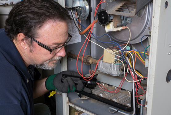 heating system repair man - Diamond Heating & AirTemp Alaska